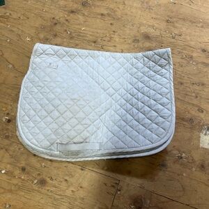Dover saddlery white pad has some staining